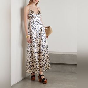 ULLA JOHNSON Evie floral-print satin maxi dress$750 40% off $450 Color: Beige